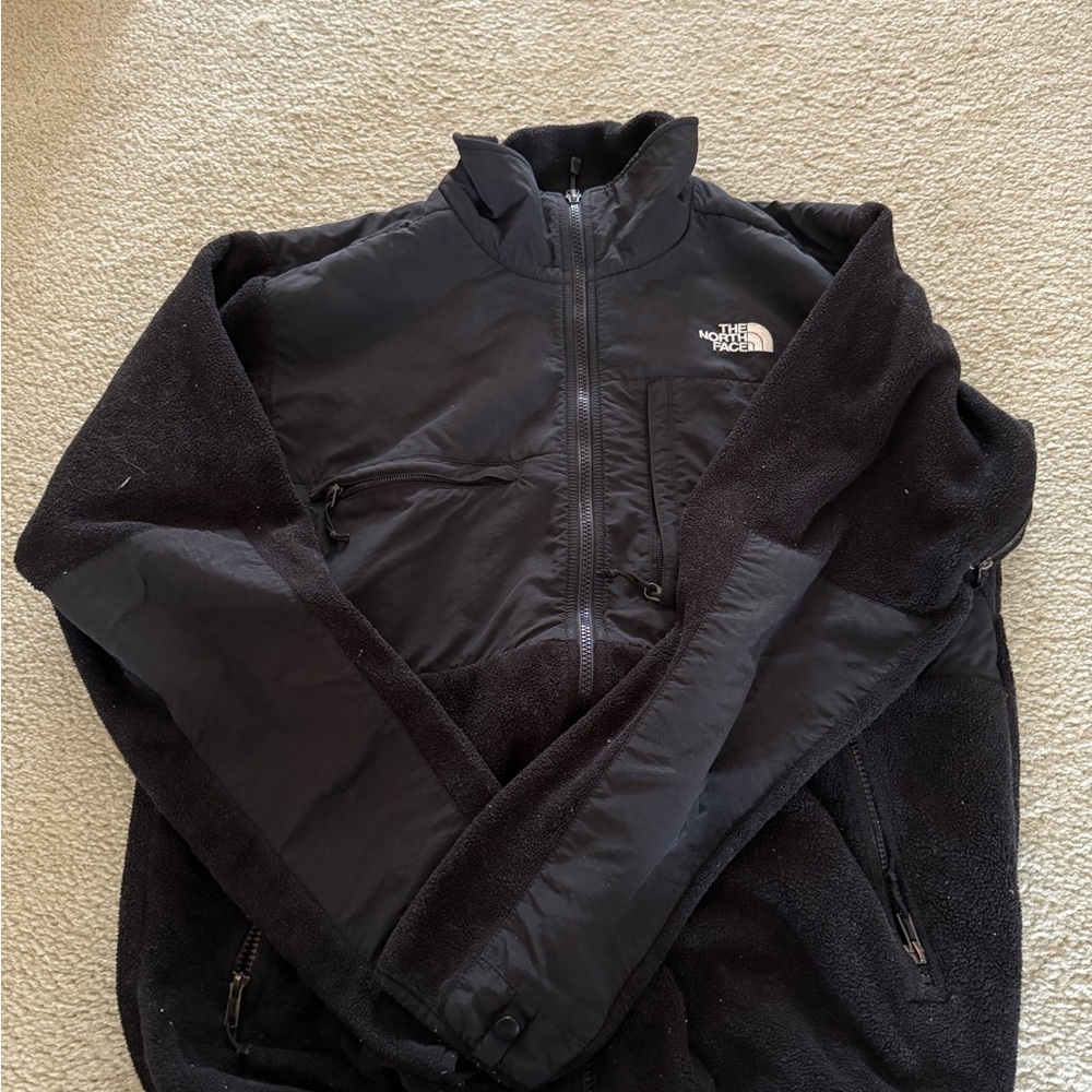 The North Face Black Windbreaker with Full-Length Zipper and Stand-Up Collar